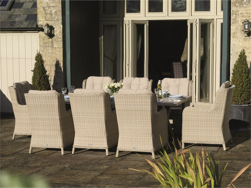 Chedworth Sandstone Ceramic Rectangle Table with 8 Rattan Armchairs photo